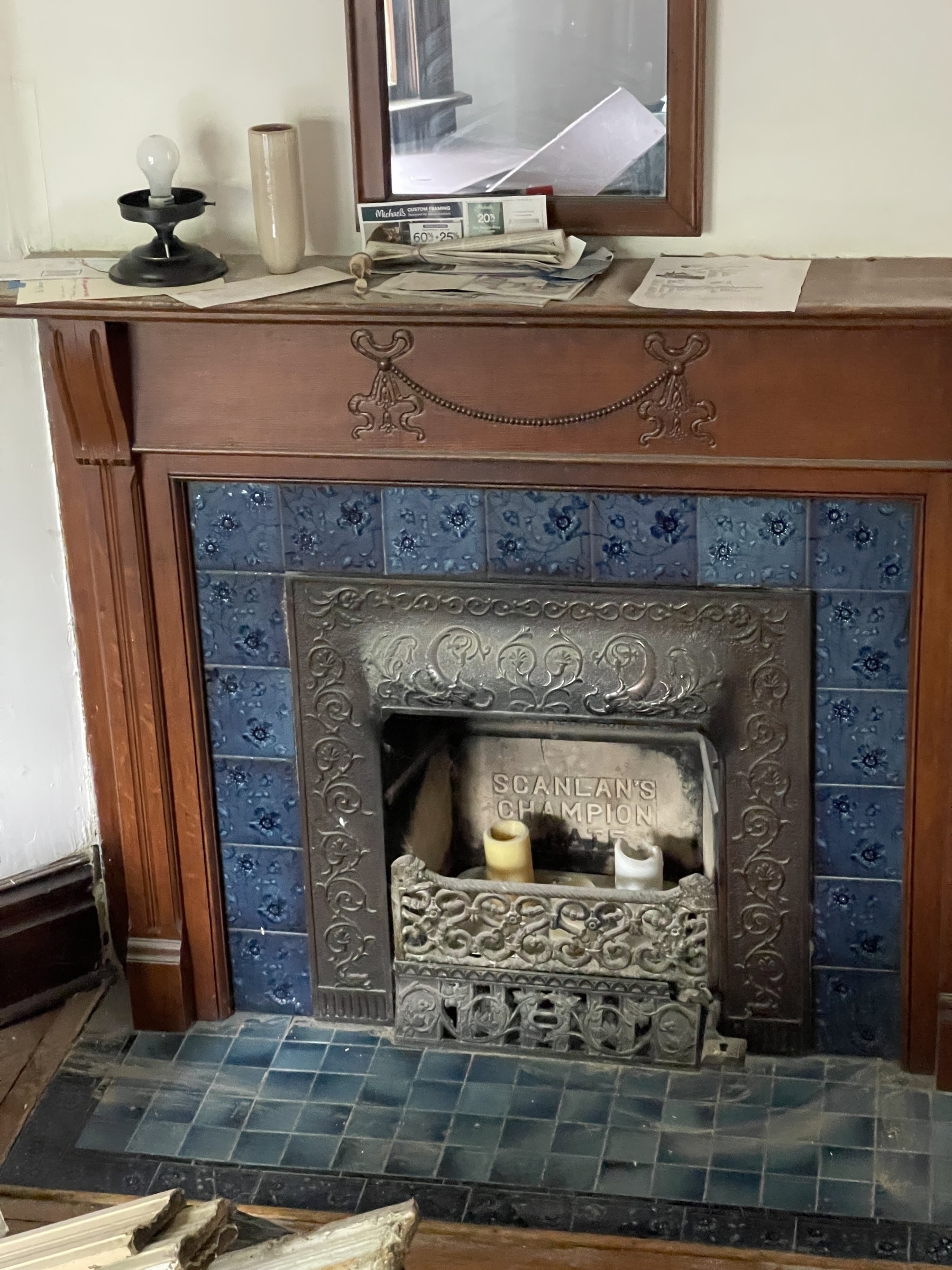 The tile! The carving in the lintel! The metalwork on the firebox! So much to love here. 